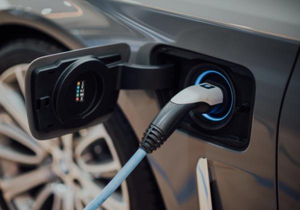 An EV charger connected to an electric vehicle.